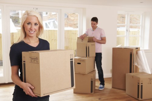 Furniture collection team handling bulky items for an Eastbedfont home