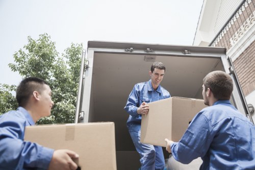Loading furniture into a van for a local move
