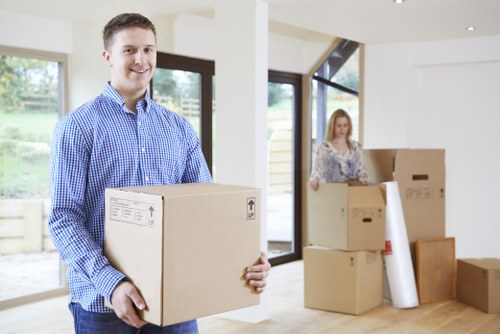 Household moving boxes and furniture prepared for collection