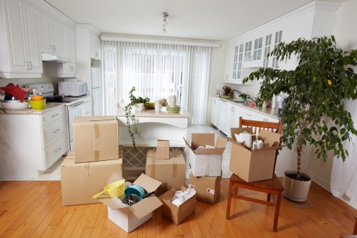 Local removals team handling a home move