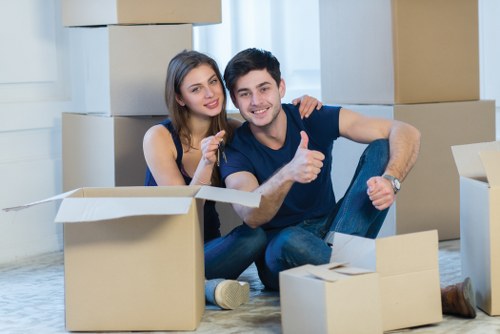 Removal crew handling fragile items during a local move