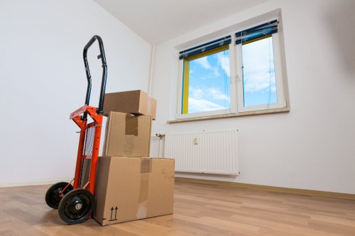 Removal team handling household furniture during a local move