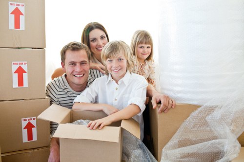 Packed boxes and furniture ready for transport in Eastbedfont