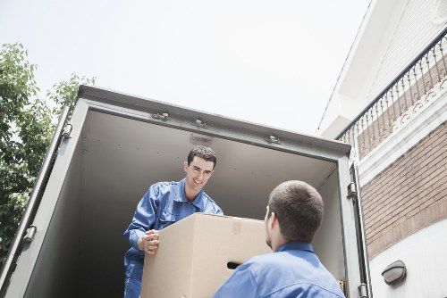 Loading items into a removal van for a local move