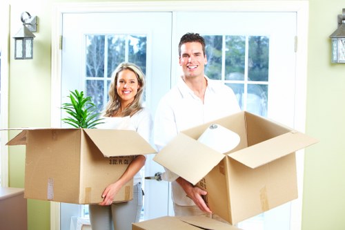 Packed household furniture and cartons prepared for transport by removalists