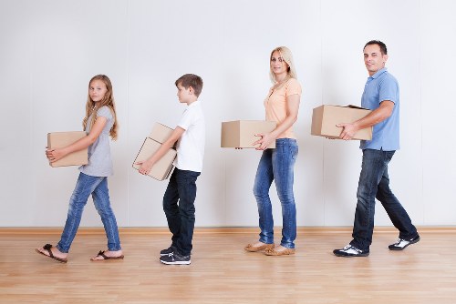 Removal team loading furniture for a house move in Eastbedfont